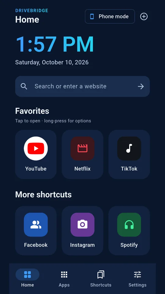 DriveBridge Home screen: a large clock and date, a search box, and big tiles for favorite apps and websites.
